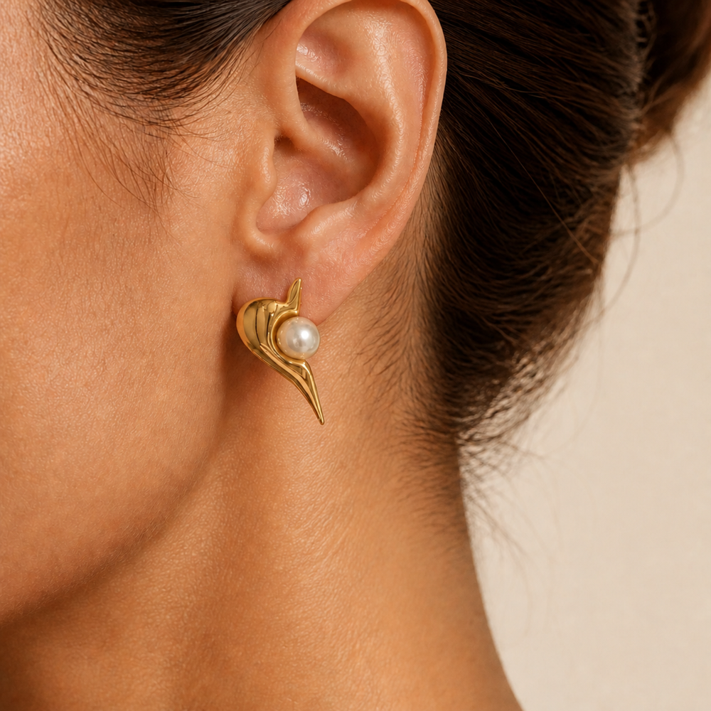 Gold pearl sculptural stud