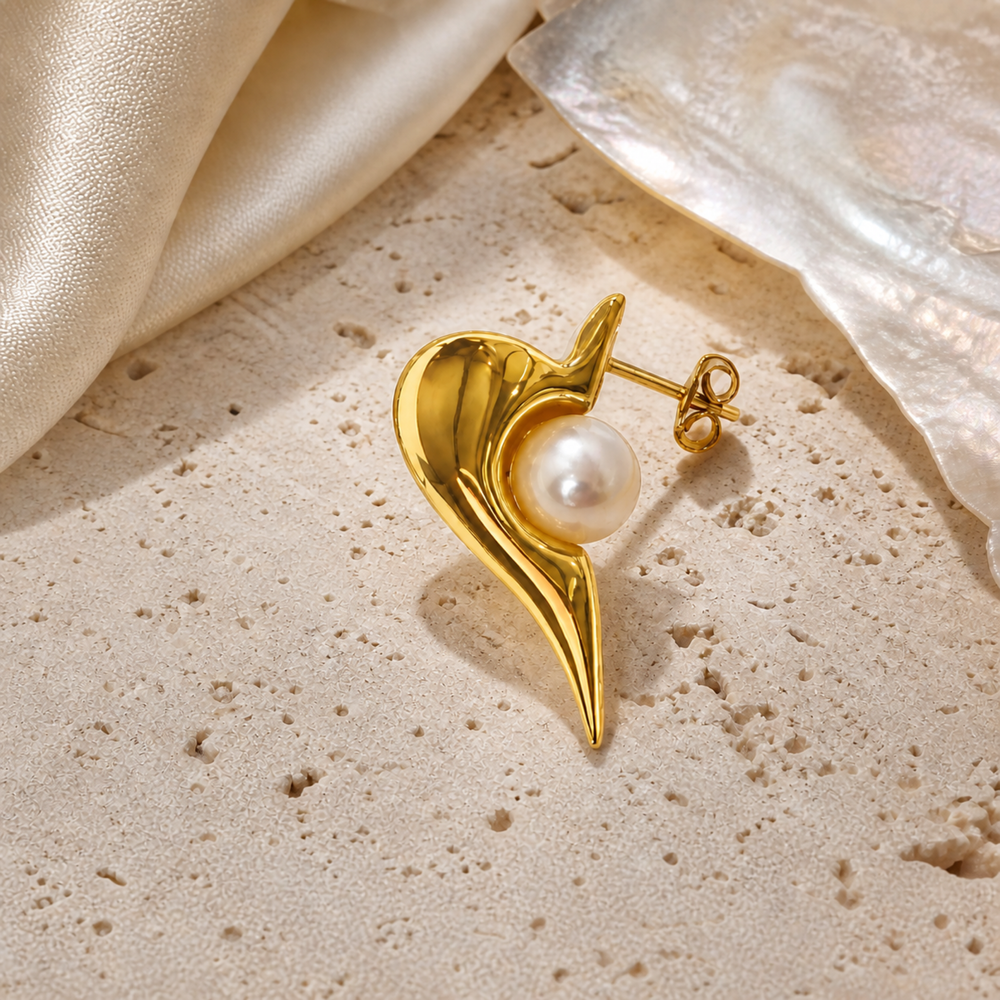 Gold pearl sculptural stud