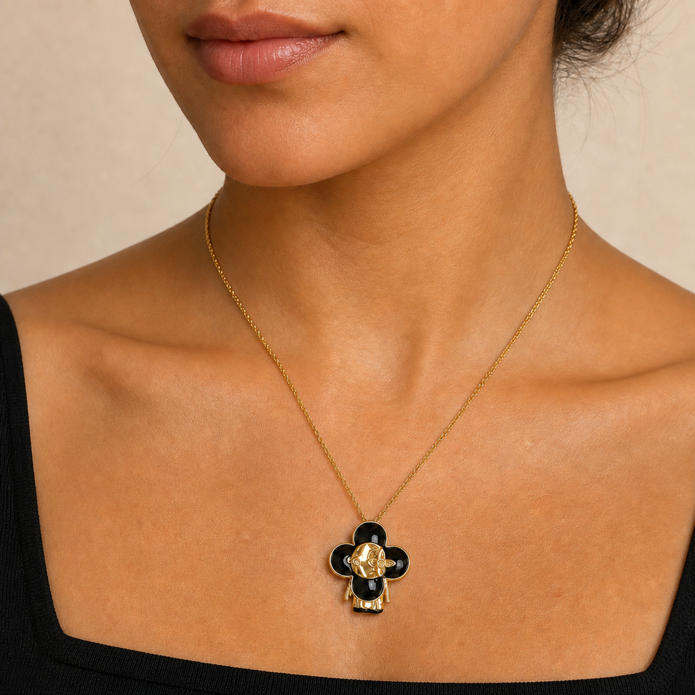 Black enamel face pendant