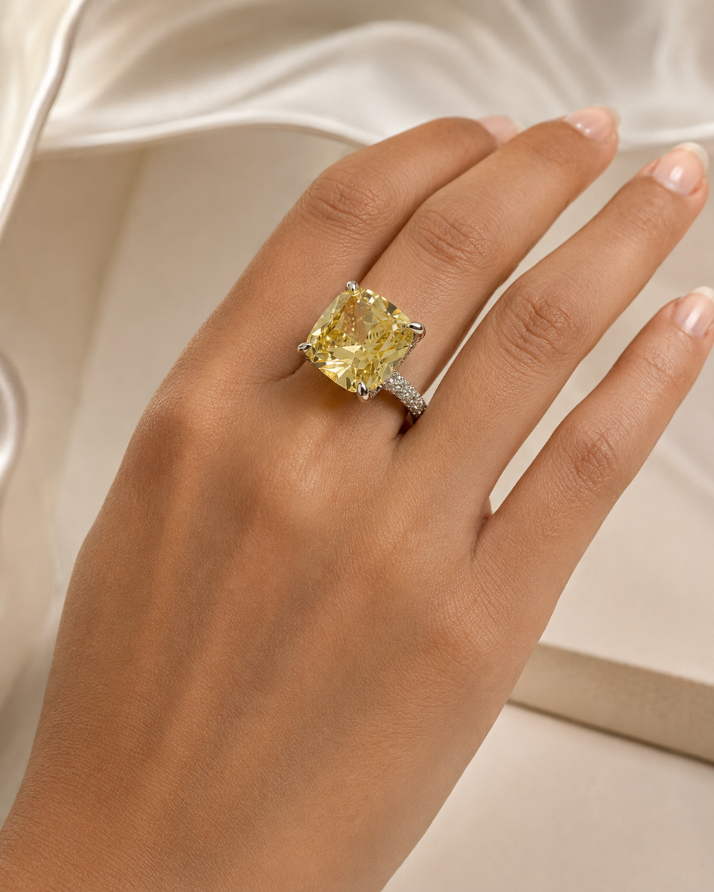 Radiant yellow diamond ring